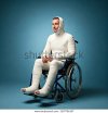 man-full-body-cast-wheelchair-600w-2507706187.jpg